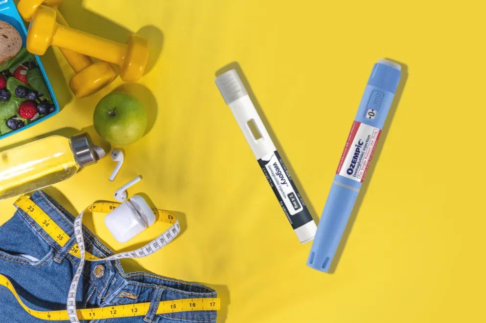 Wegovy and Ozempic on Yellow Background with Fitness Items