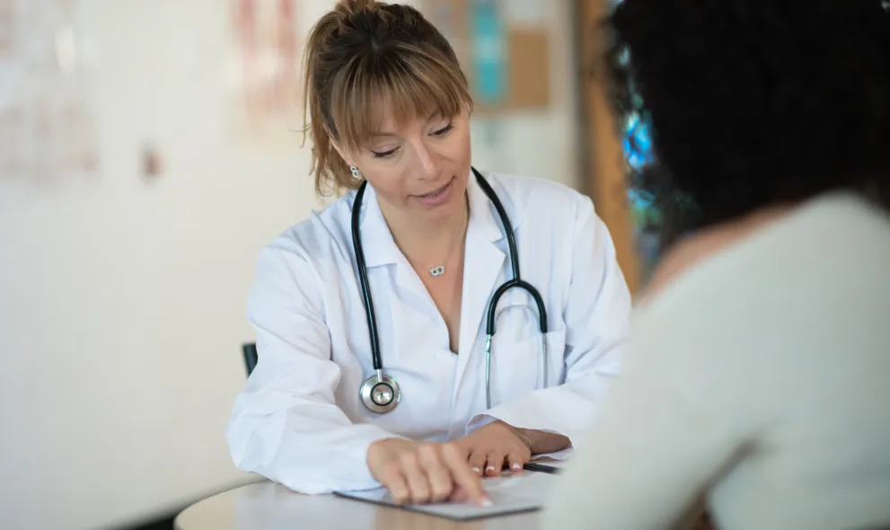 Doctor speaking to patient