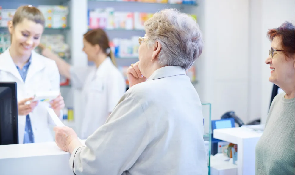 Patients waiting in line at pharmacy