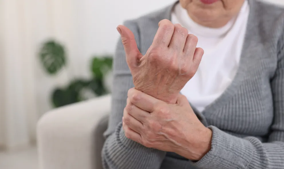Senior woman suffering with arthritis pain